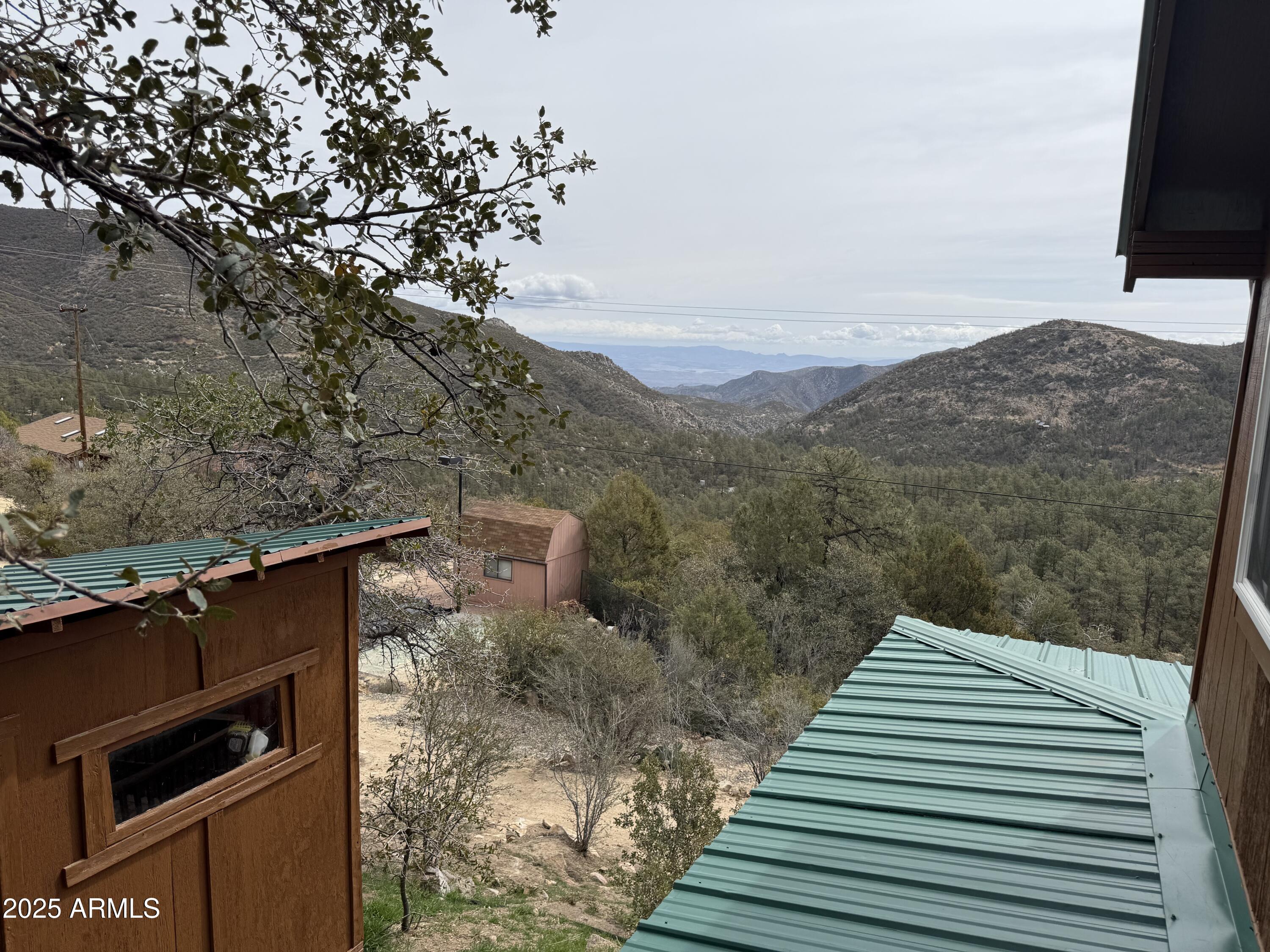 23442 Manzanita Road Crown King, AZ 86343 - Photo 24 of 41 a view of a balcony with an outdoor space