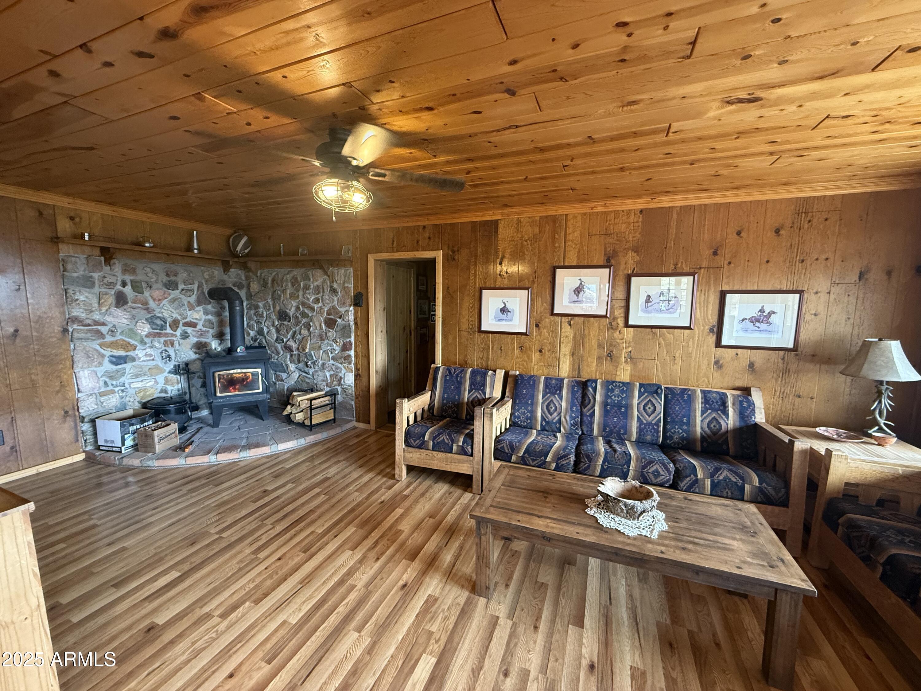23442 Manzanita Road Crown King, AZ 86343 - Photo 3 of 41 a view of a livingroom with furniture and window