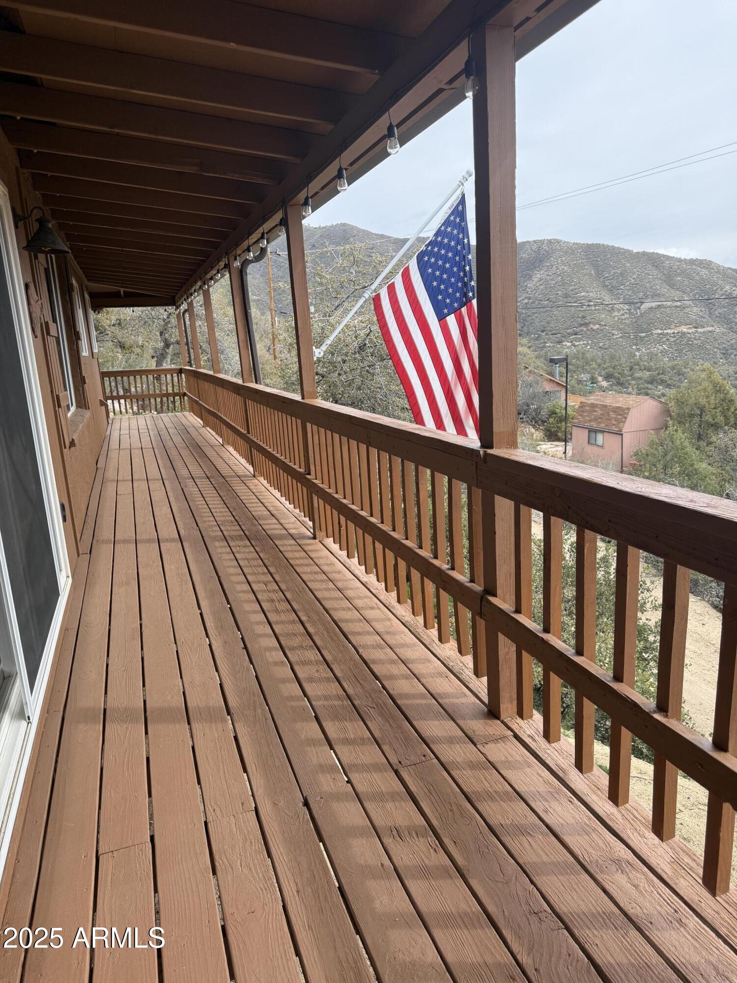 23442 Manzanita Road Crown King, AZ 86343 - Photo 32 of 41 a view of balcony with wooden floor