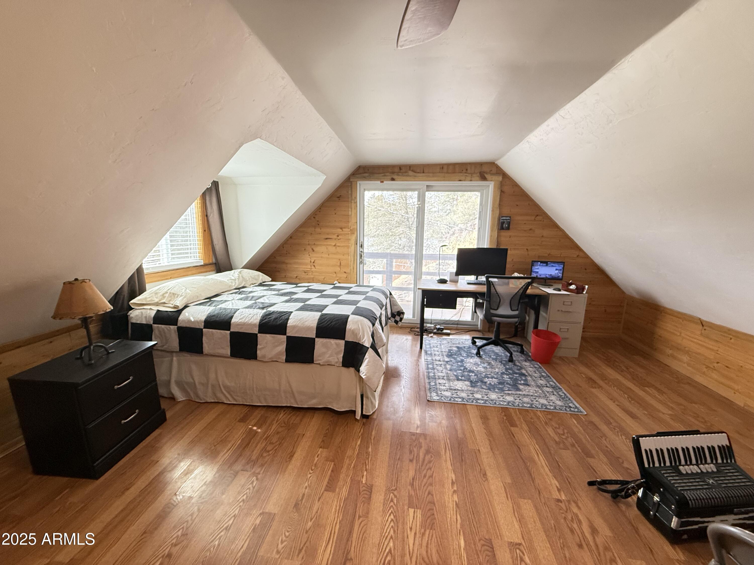 23442 Manzanita Road Crown King, AZ 86343 - Photo 10 of 41 a living room with furniture and a wooden floor