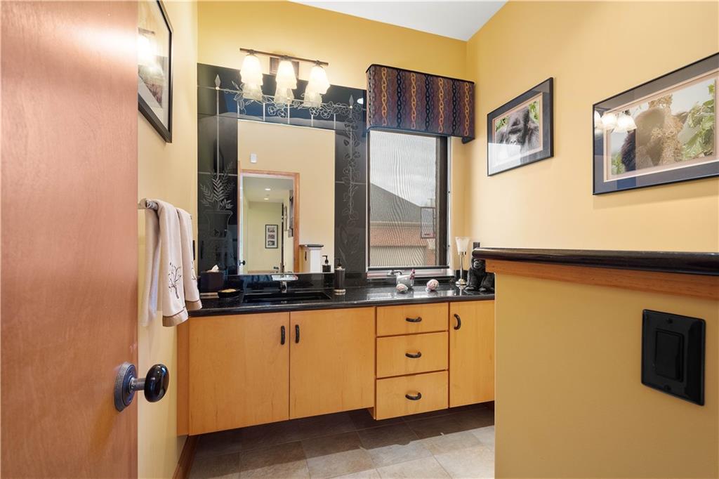 108 Saddle Ridge Drive Oakdale, PA 15071 - Photo 21 of 50 a bathroom with a double vanity sink and a mirror
