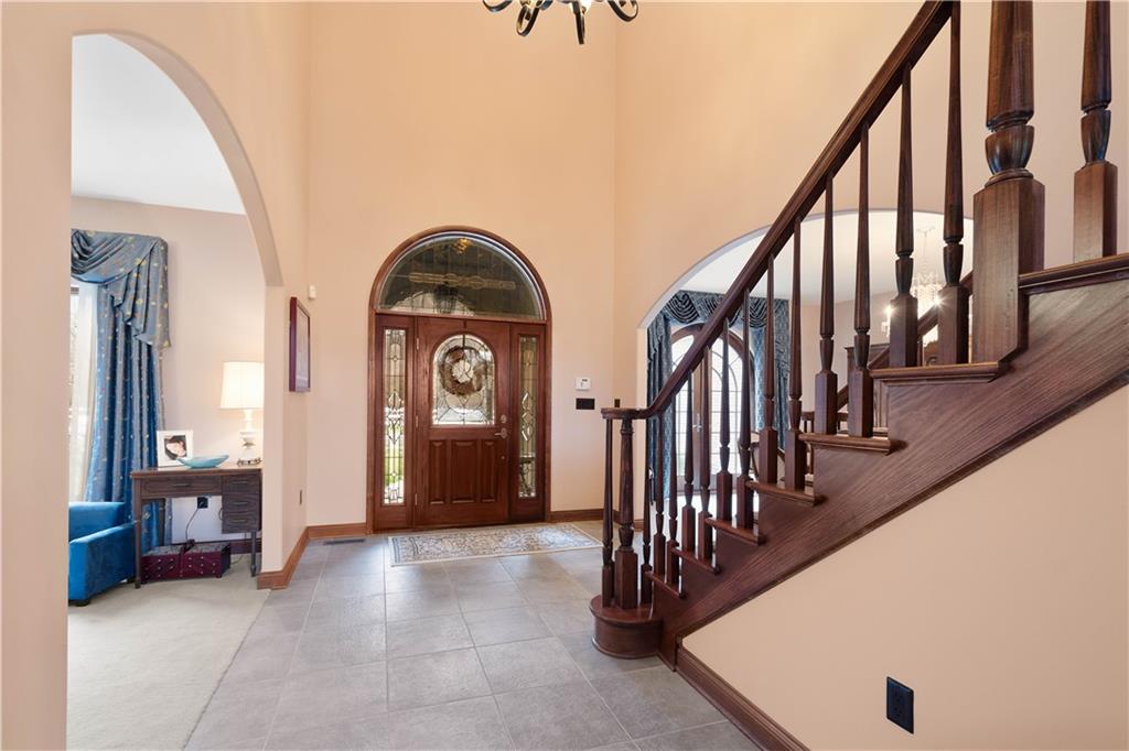 108 Saddle Ridge Drive Oakdale, PA 15071 - Photo 4 of 50 a view of a hallway with entryway wooden floor and stairs