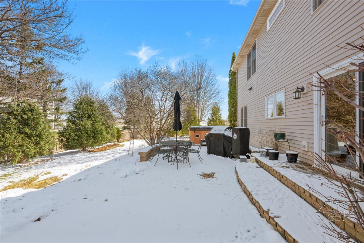 N160 Yates Place Geneva, IL 60134 - Photo 27 of 30 a view of a backyard with sitting area