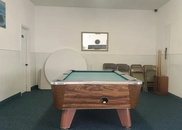 a view of a hallway with washer and dryer
