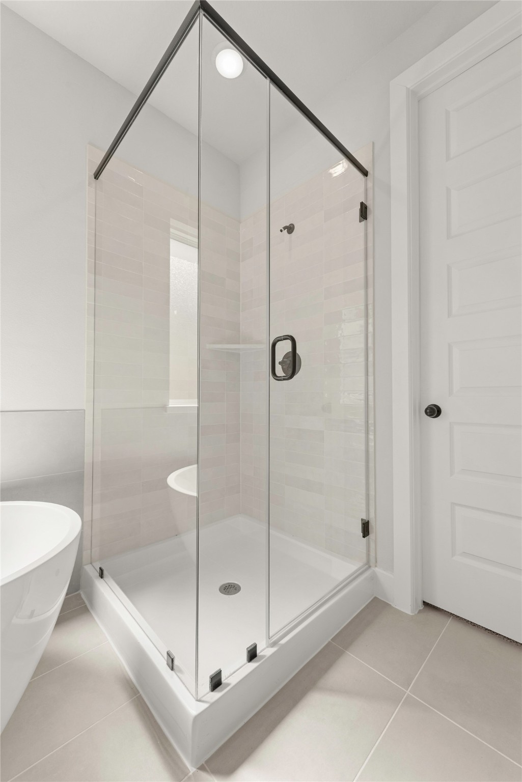 10950 Middle Rdg Drive Missouri City, TX 77459 - Photo 11 of 21 a bathroom with a shower and a bathtub