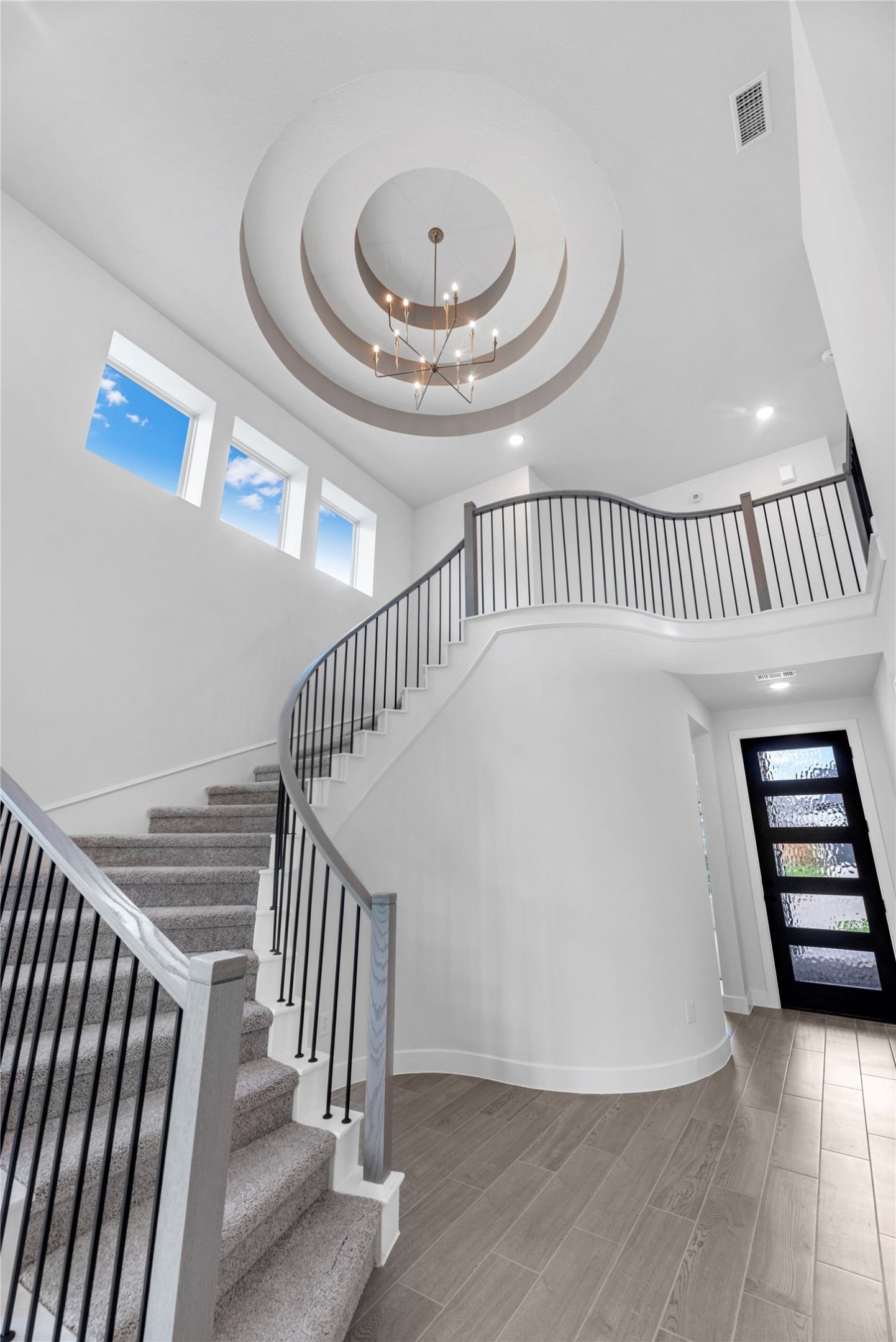 10950 Middle Rdg Drive Missouri City, TX 77459 - Photo 2 of 28 a view of staircase with white walls and a window