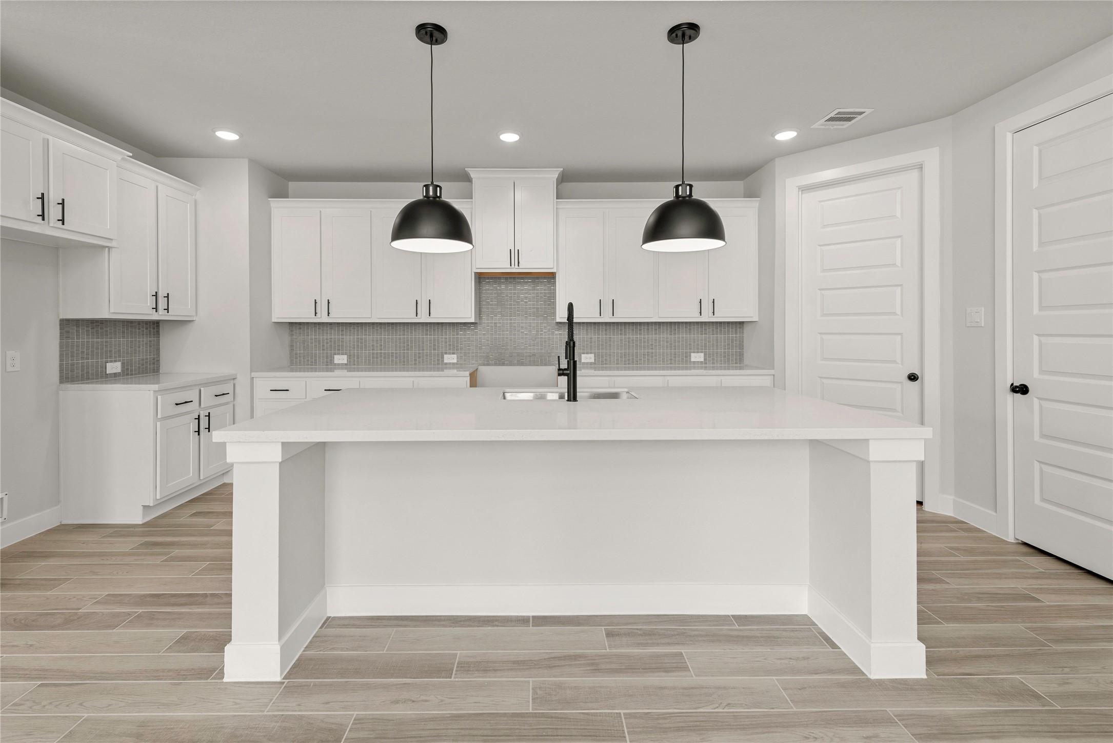 10950 Middle Rdg Drive Missouri City, TX 77459 - Photo 5 of 21 a kitchen with a sink stainless steel appliances and cabinets