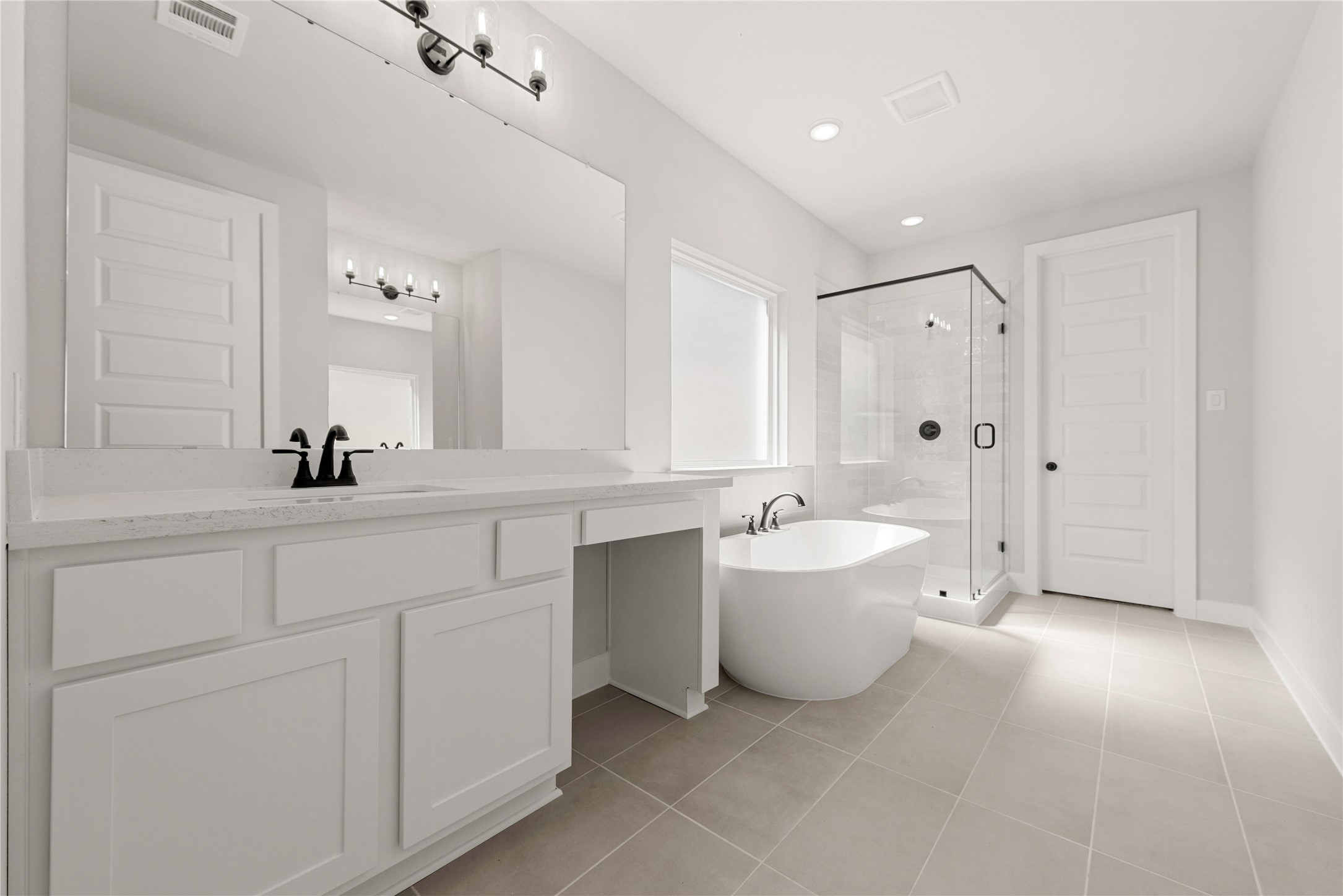 10950 Middle Rdg Drive Missouri City, TX 77459 - Photo 8 of 21 a bathroom with a bathtub shower sink and toilet