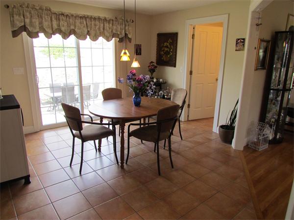 52 Vista Circle Rutland, MA 01543 - Photo 8 of 30 a view of a dining room with furniture and a window