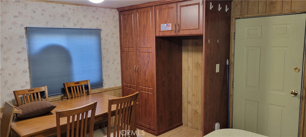 3661 Pacific Avenue, Unit 22 Jurupa Valley, CA 92509 - Photo 11 of 32 a view of chair and wooden door