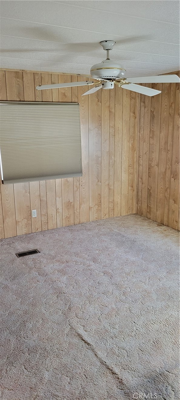 3661 Pacific Avenue, Unit 22 Jurupa Valley, CA 92509 - Photo 16 of 32 a view of a room with an empty space and a window