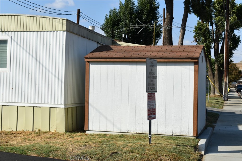 3661 Pacific Avenue, Unit 22 Jurupa Valley, CA 92509 - Photo 7 of 32 a view of a house with backyard