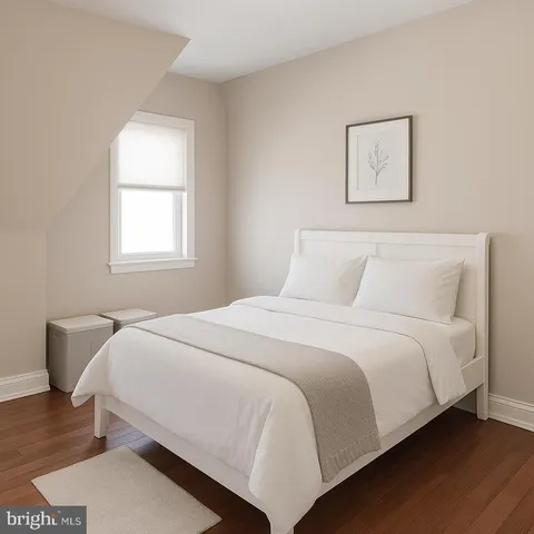 a bedroom with a bed and a dresser