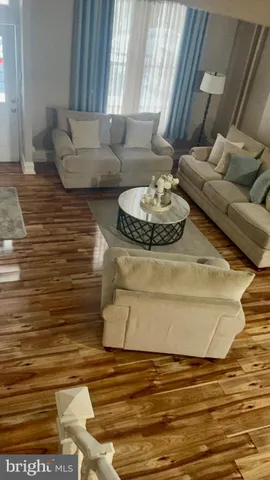 a kitchen with kitchen island granite countertop a sink and a stove