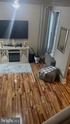 a bedroom with a bed and furniture