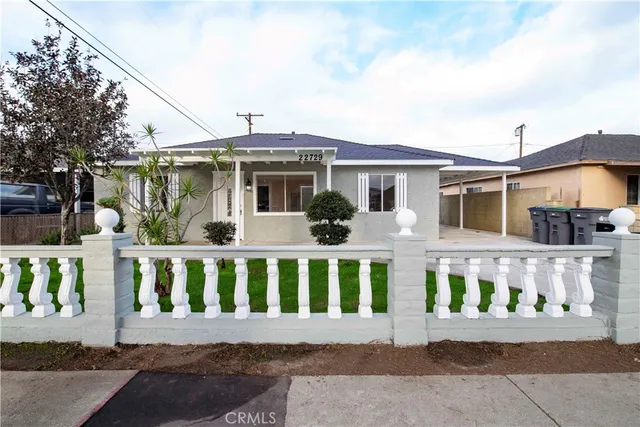 a front view of a house with a porch