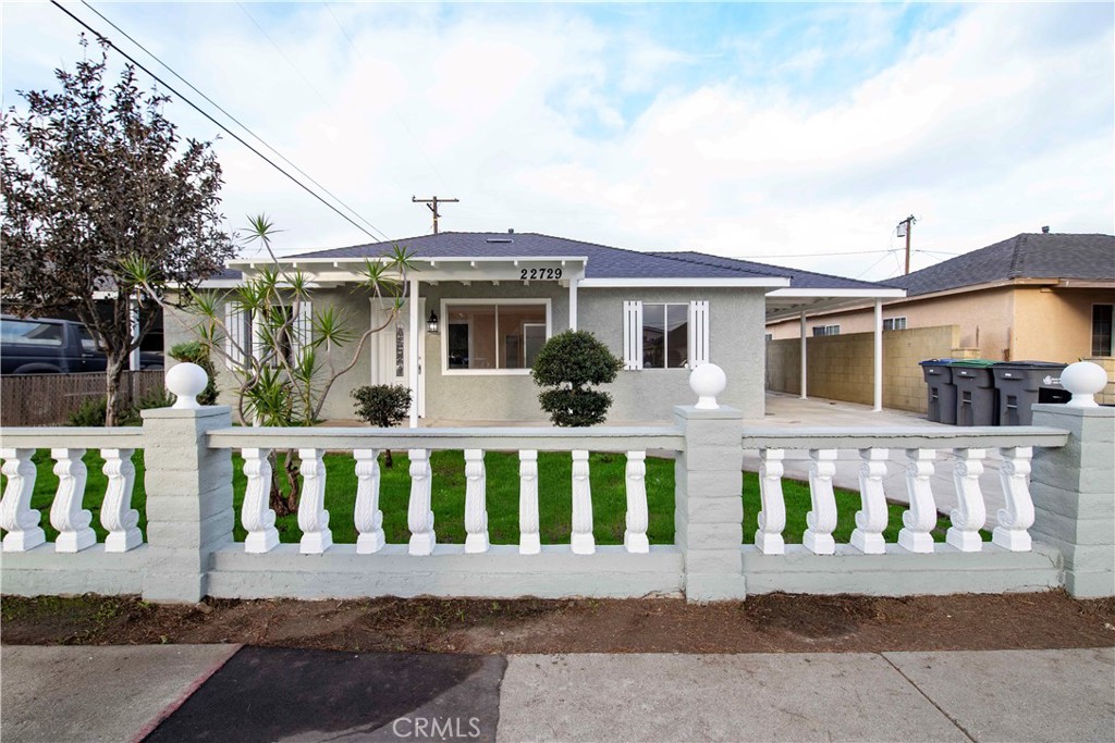 a front view of a house with a porch