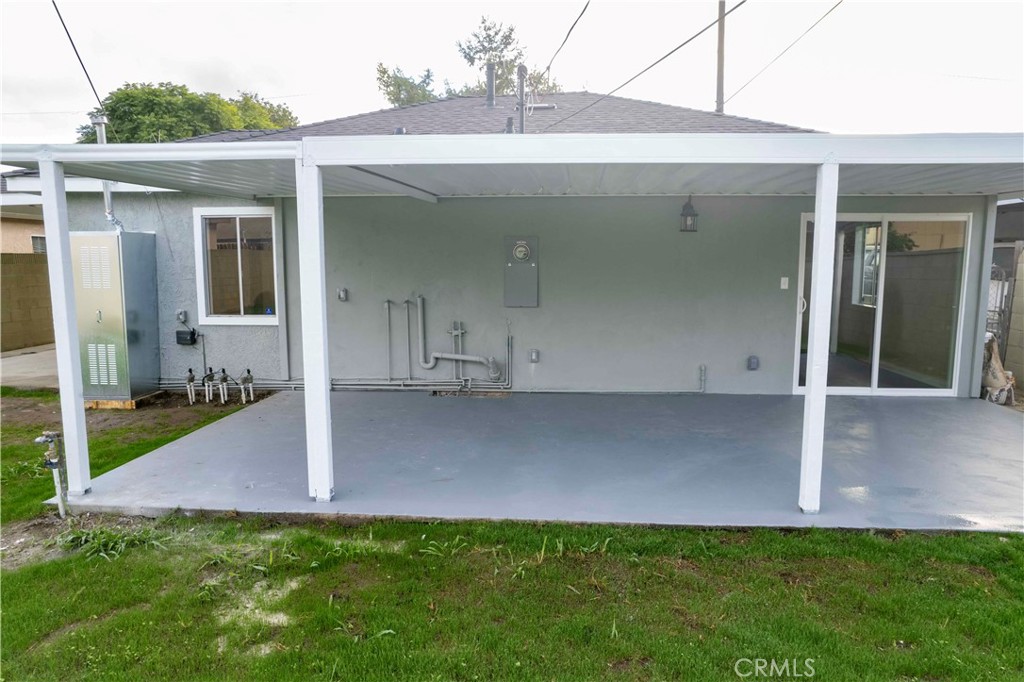 22729 Marbella Avenue Carson, CA 90745 - Photo 23 of 57 a view of a house with backyard and porch