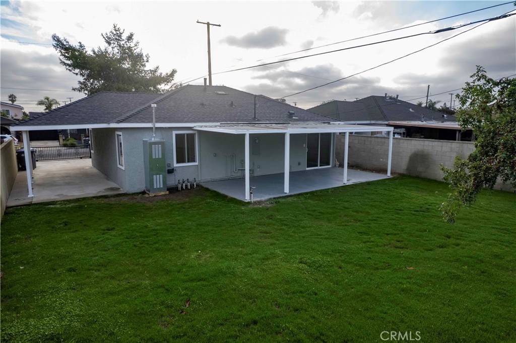 22729 Marbella Avenue Carson, CA 90745 - Photo 24 of 57 a view of a house with a garden