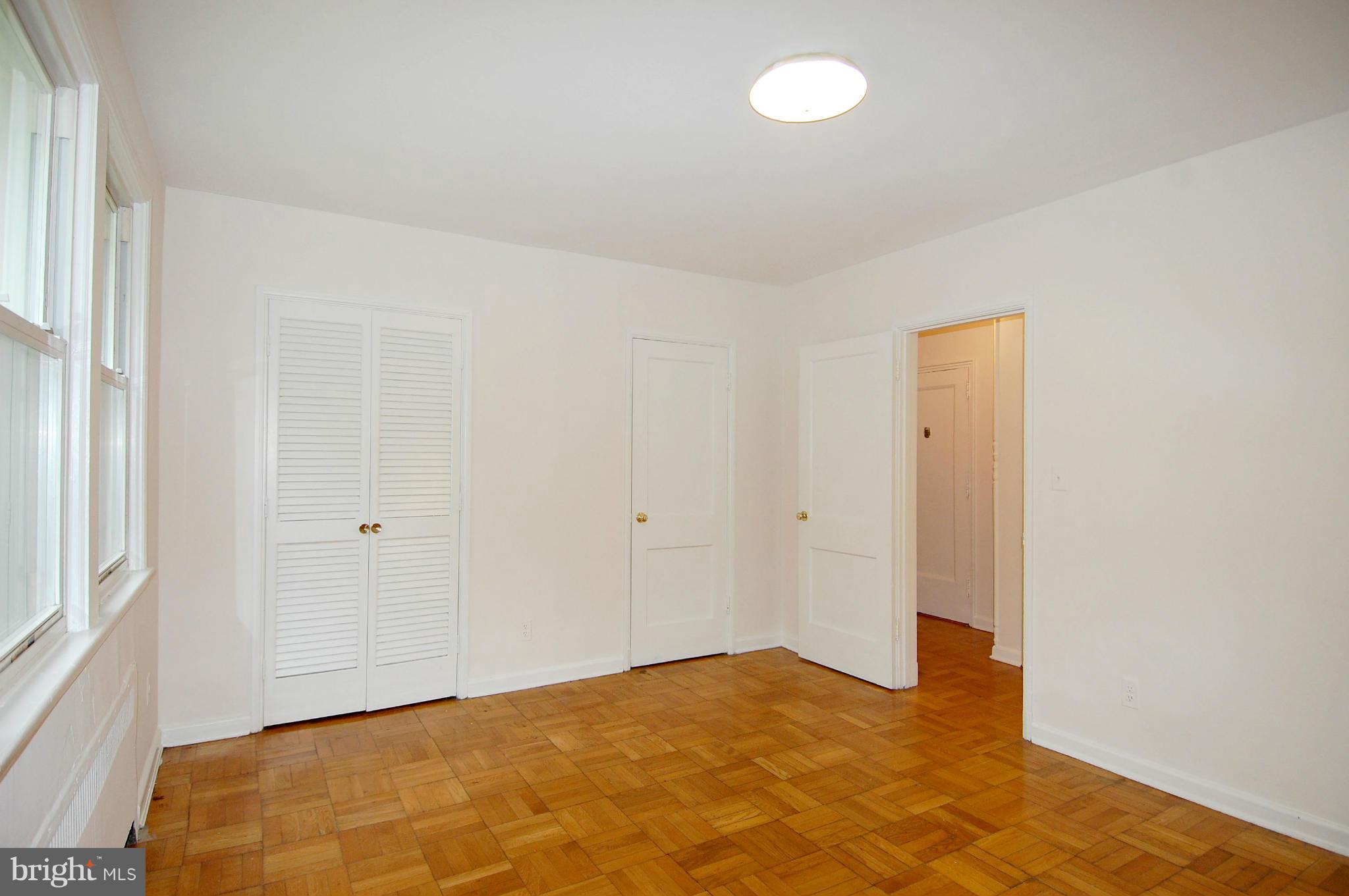 4000 Beecher Street Northwest, Unit 101 Washington, DC 20007 - Photo 18 of 26 a view of an empty room