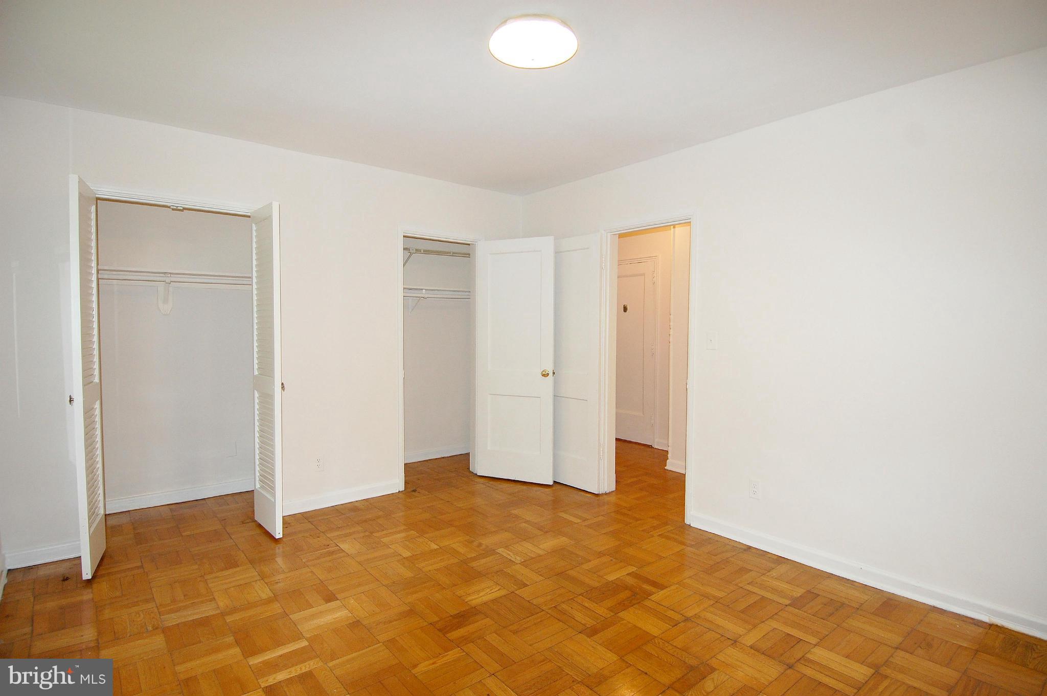 4000 Beecher Street Northwest, Unit 101 Washington, DC 20007 - Photo 20 of 26 a view of an empty room