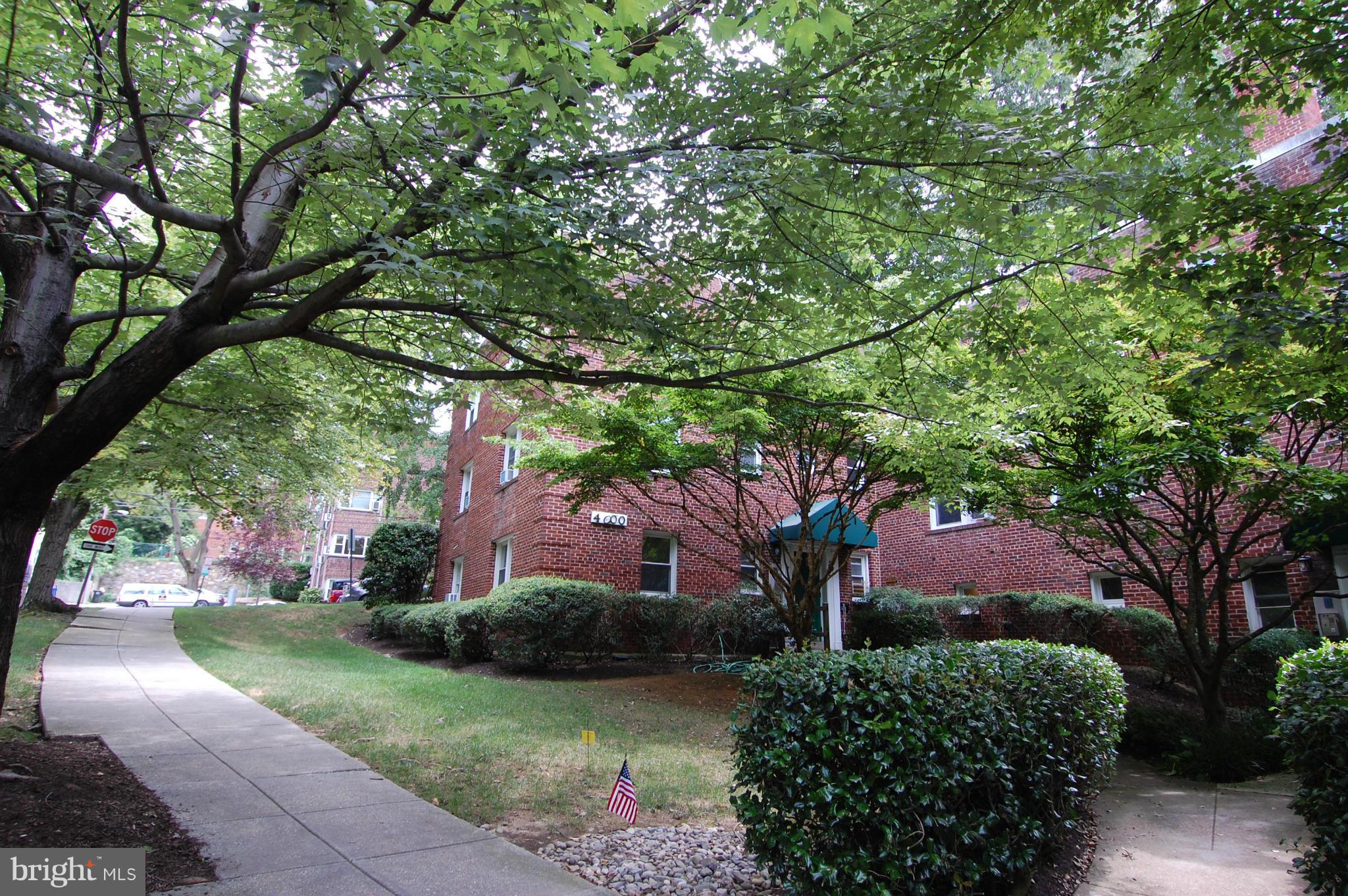 4000 Beecher Street Northwest, Unit 101 Washington, DC 20007 - Photo 26 of 26 a front view of a house with garden