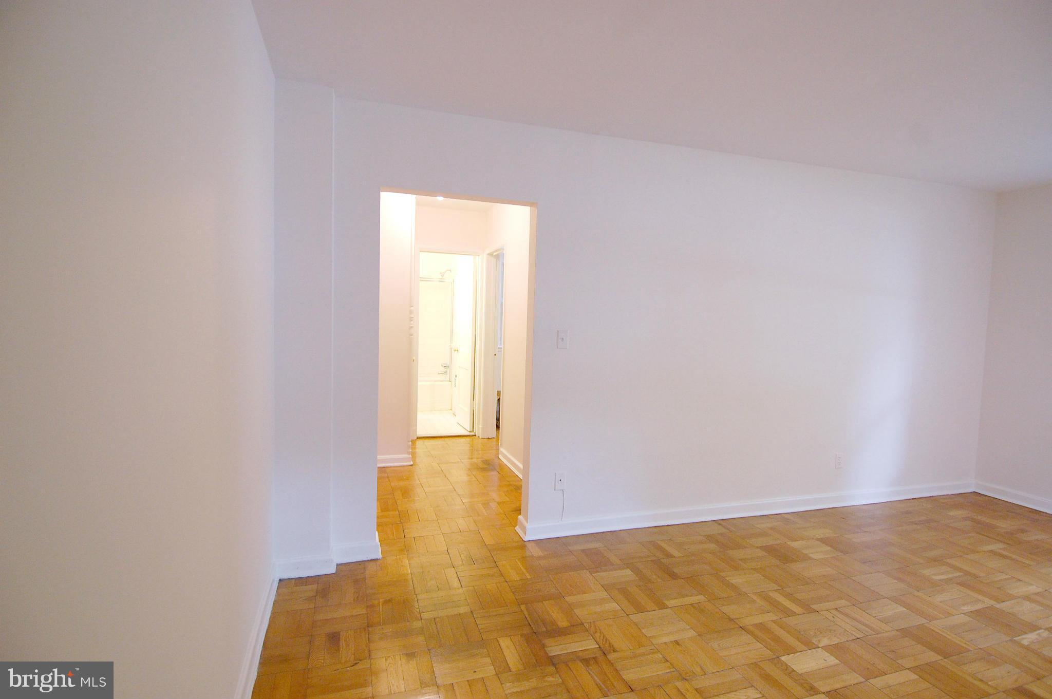 4000 Beecher Street Northwest, Unit 101 Washington, DC 20007 - Photo 10 of 26 a view of an empty room