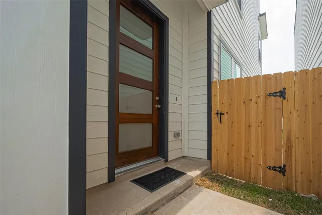a view of a door and a window