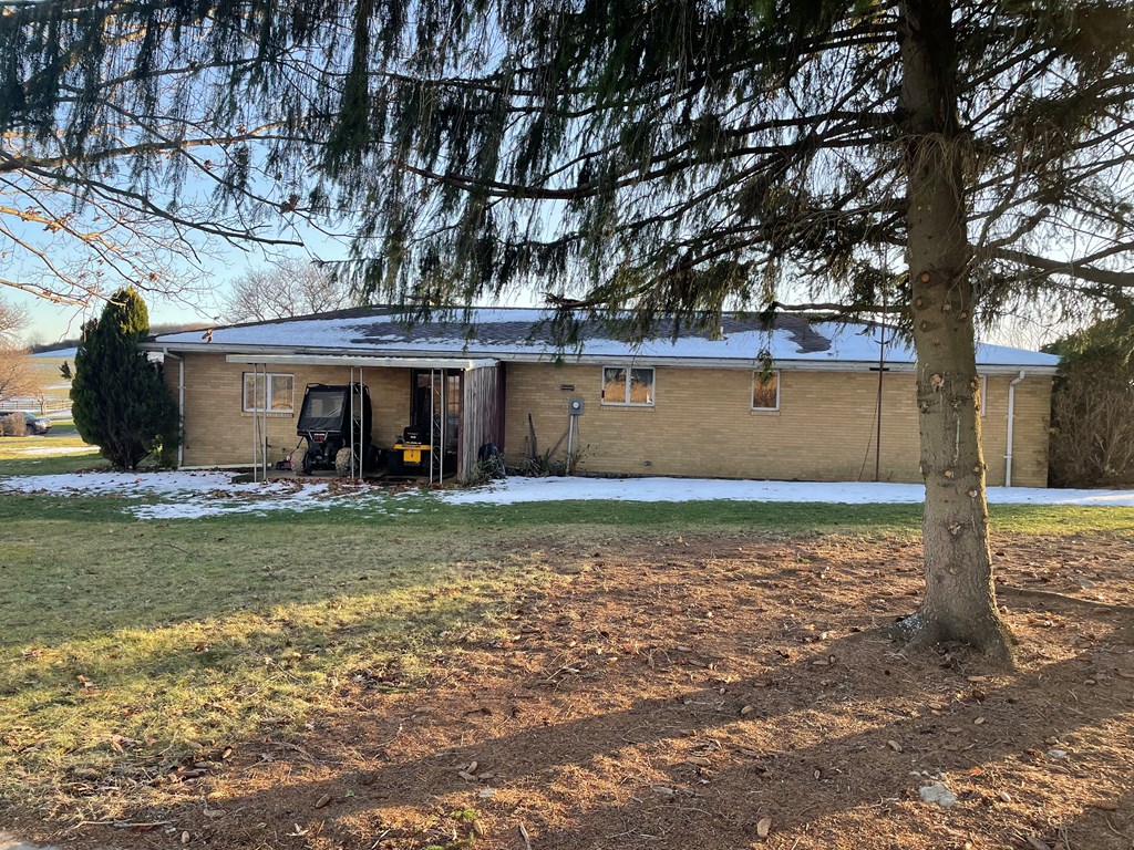 1629 Ringgold Timblin Road Ringgold, PA 15770 - Photo 22 of 24 a view of a house with a yard