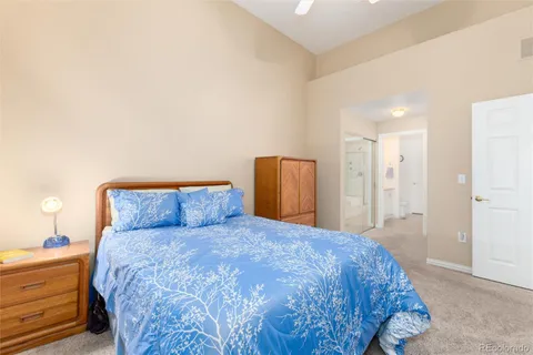 a large bed sitting in a bedroom and a room