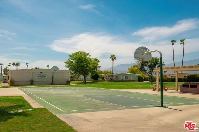 a view of a golf course with a garden