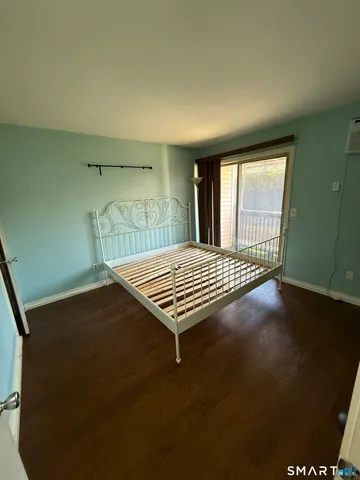 a view of a hallway with stairs