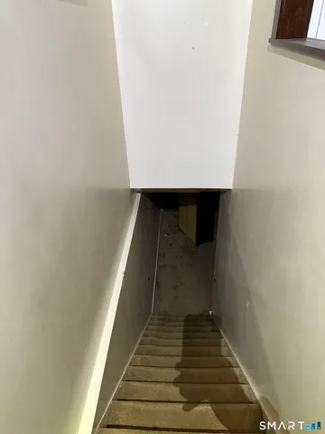 a view of a room with rack on the wall