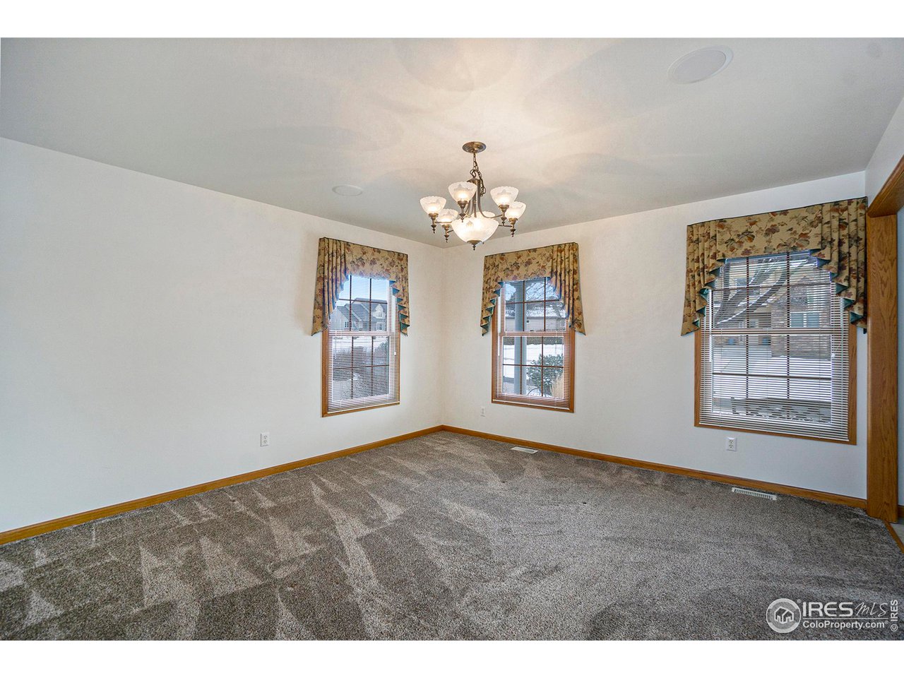 1430 Falcon Ridge Road Eaton, CO 80615 - Photo 13 of 34 Dining room