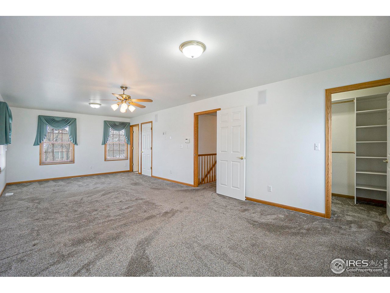 1430 Falcon Ridge Road Eaton, CO 80615 - Photo 18 of 34 Large primary bedroom