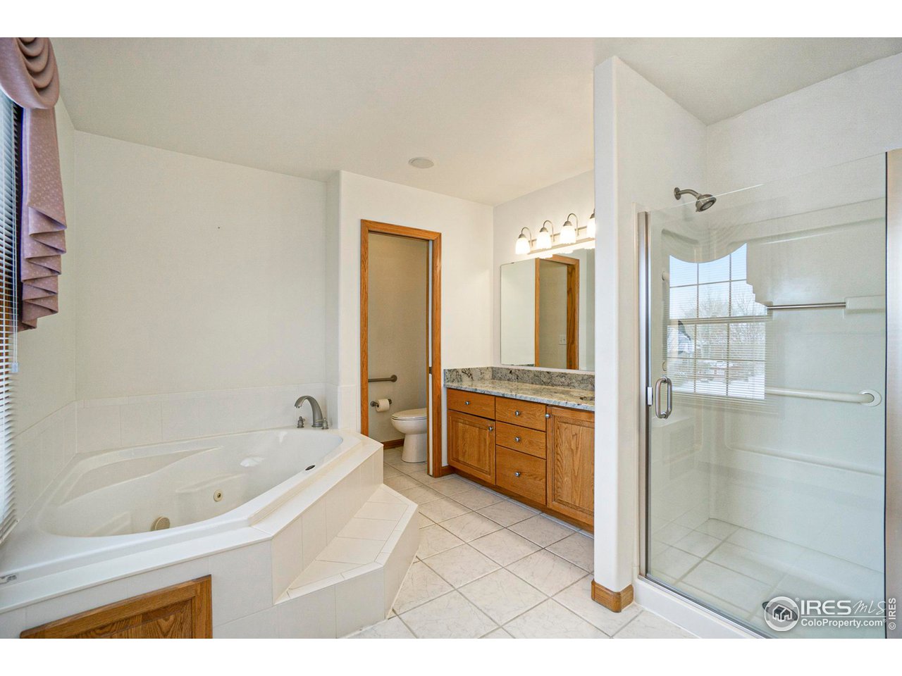 1430 Falcon Ridge Road Eaton, CO 80615 - Photo 20 of 34 Primary suite