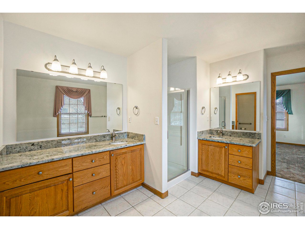1430 Falcon Ridge Road Eaton, CO 80615 - Photo 21 of 34 Primary suite