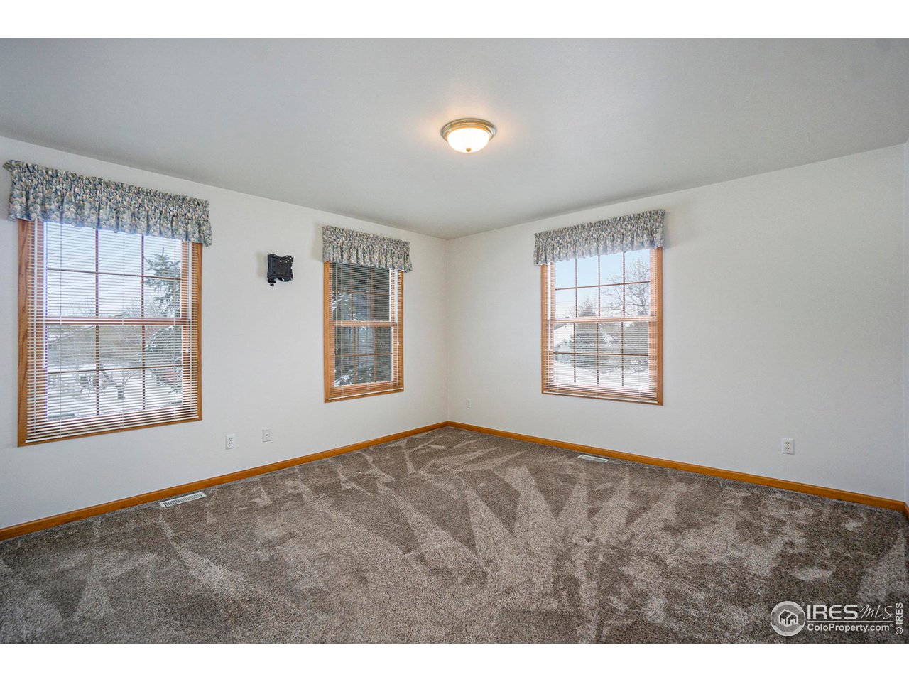 1430 Falcon Ridge Road Eaton, CO 80615 - Photo 22 of 34 Upper bedroom
