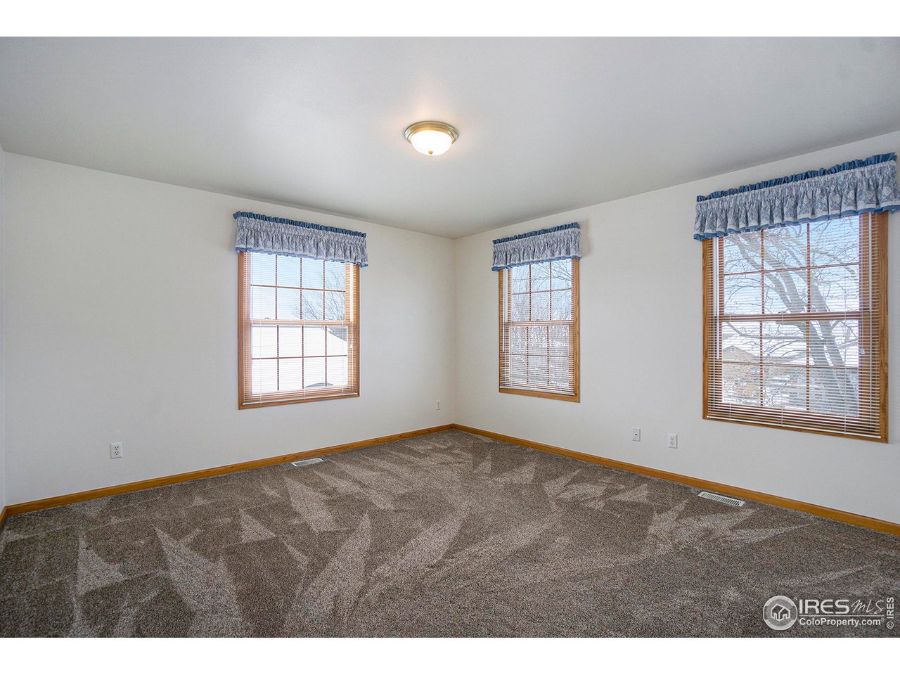 1430 Falcon Ridge Road Eaton, CO 80615 - Photo 23 of 34 Upper bedroom