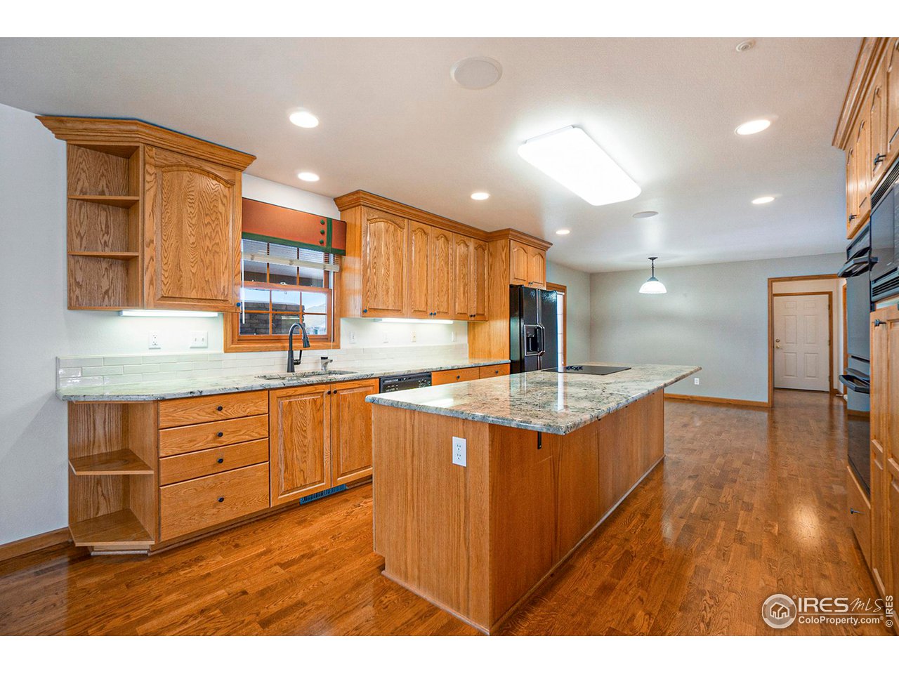 1430 Falcon Ridge Road Eaton, CO 80615 - Photo 5 of 34 Granite counters