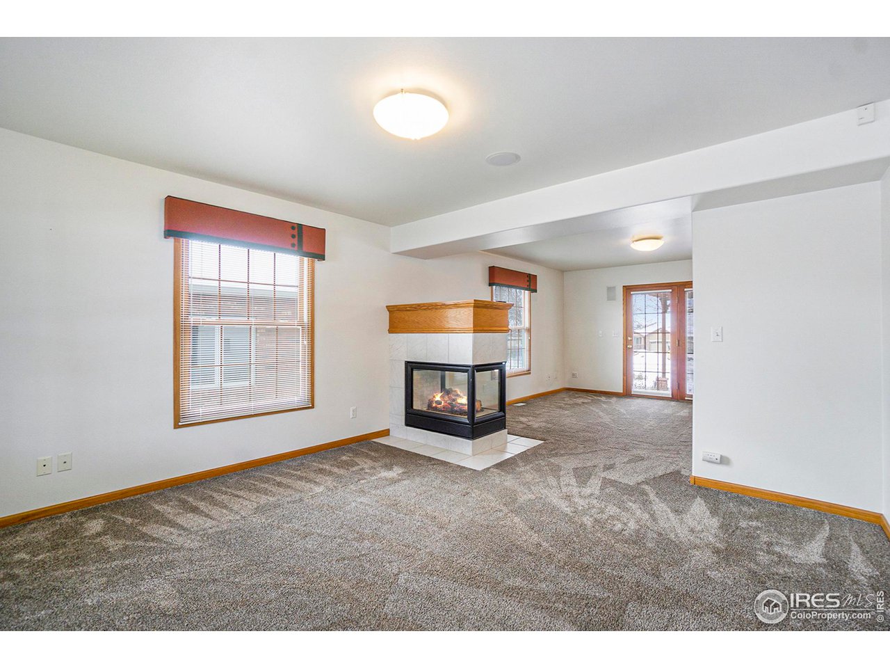 1430 Falcon Ridge Road Eaton, CO 80615 - Photo 10 of 34 Living/family room