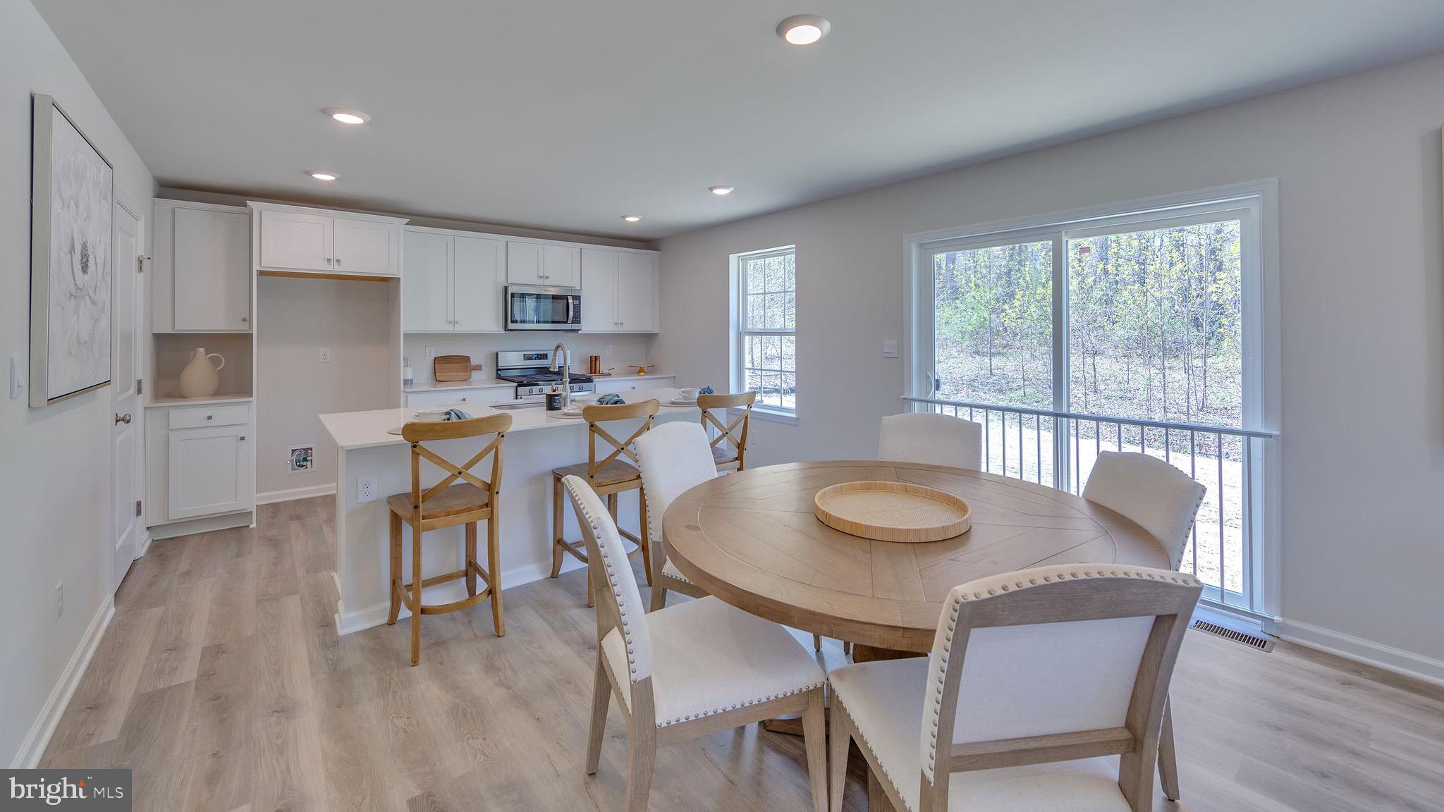 2049 Paperback Way York, PA 17408 - Photo 12 of 28 a dining room with furniture and wooden floor