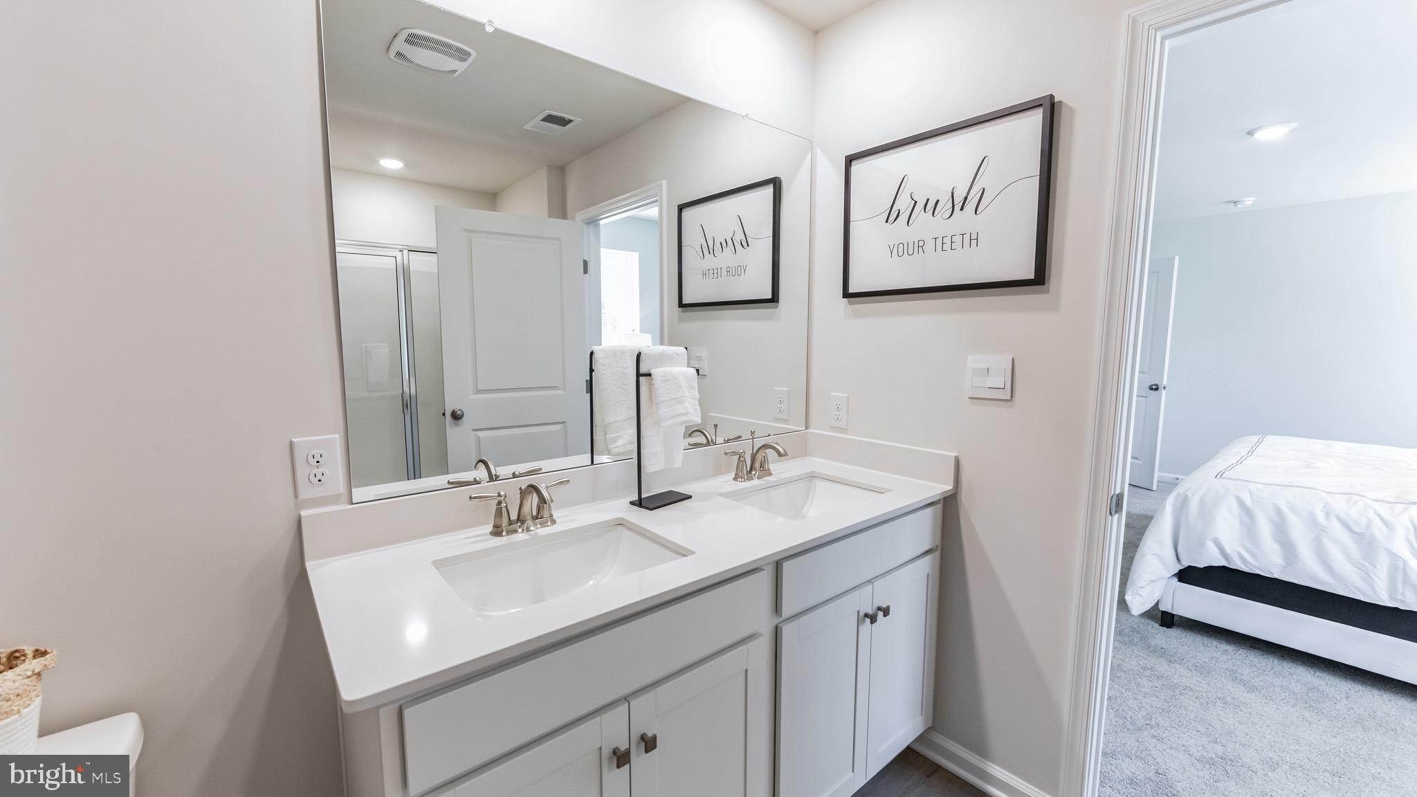 2049 Paperback Way York, PA 17408 - Photo 17 of 28 a en suite bathroom with a sink and a mirror