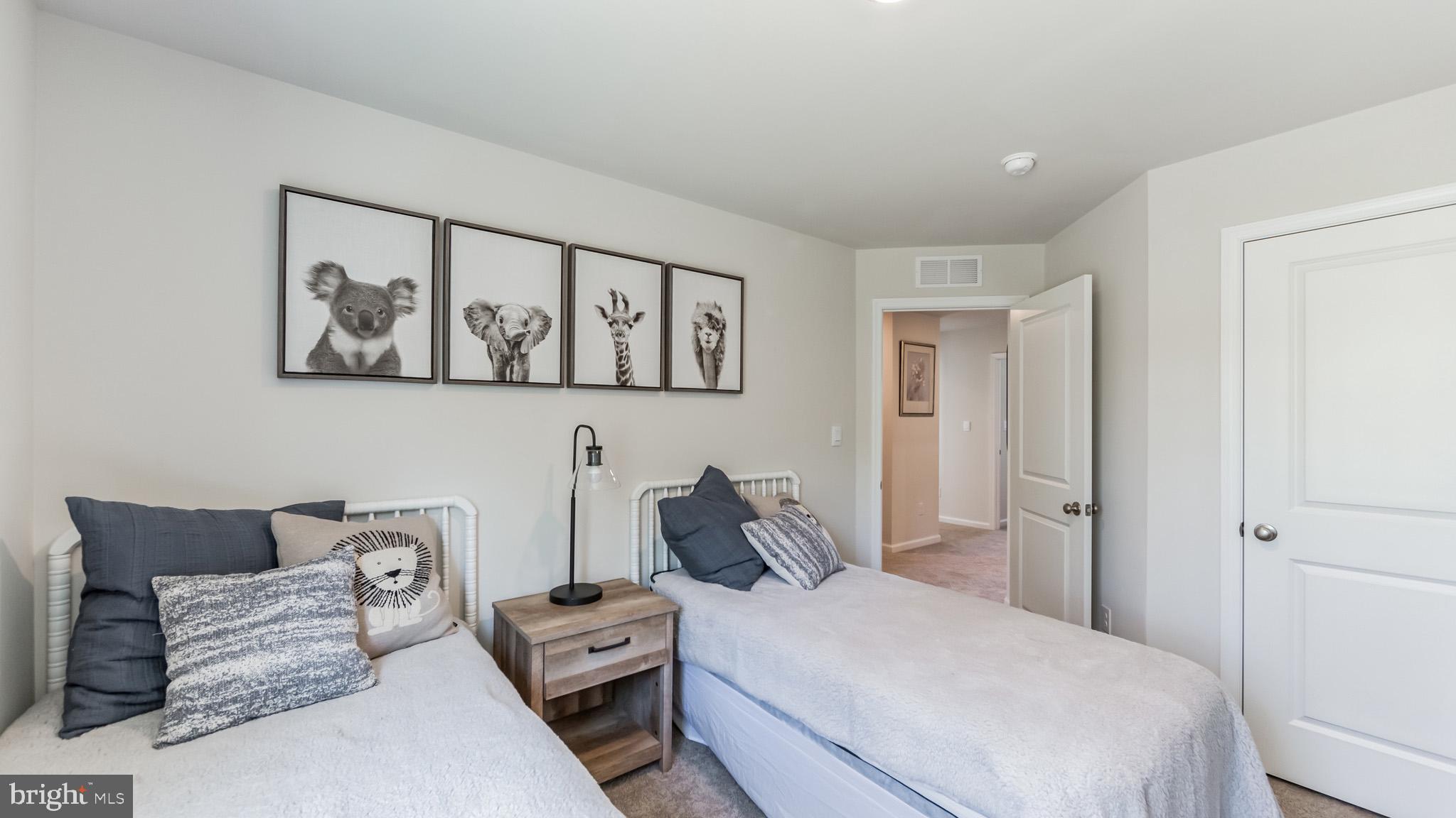 2049 Paperback Way York, PA 17408 - Photo 22 of 28 a bedroom with furniture and baby crib