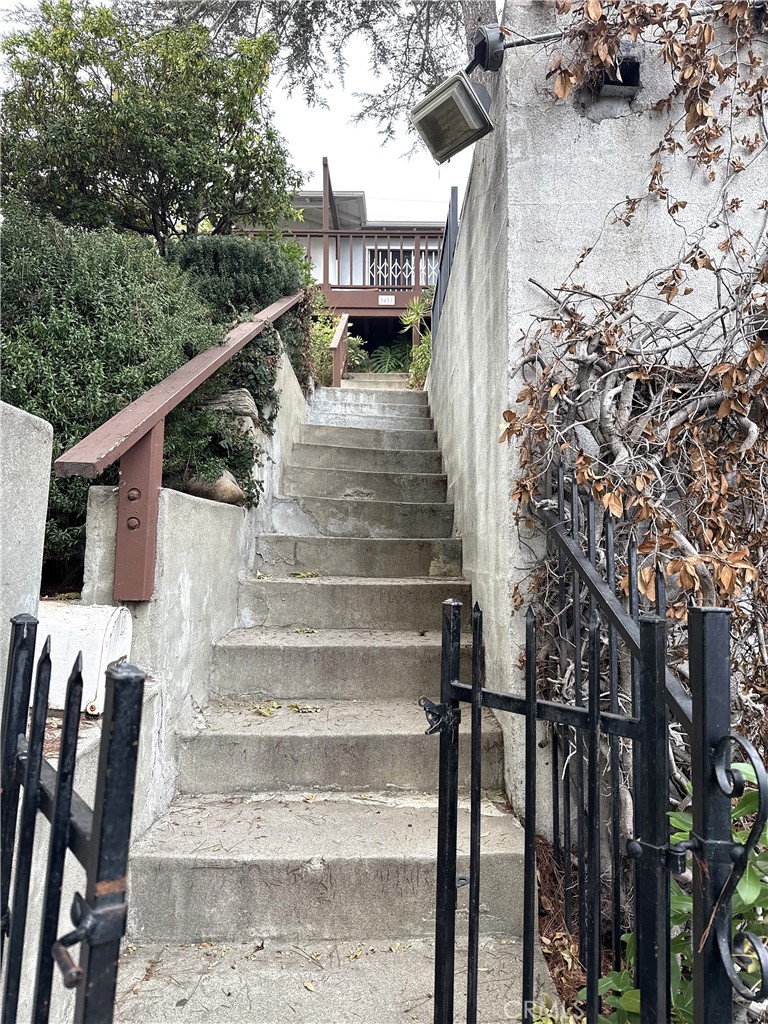 A home with character, marked by it's long set of steps.
