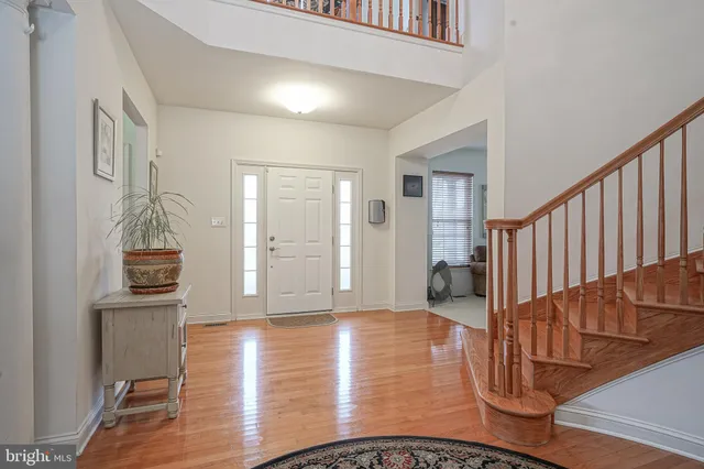 a view of entryway with wooden floor