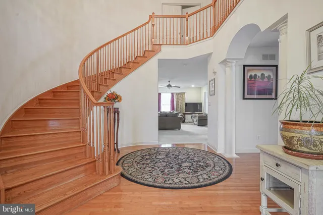 a view of entryway livingroom and hall