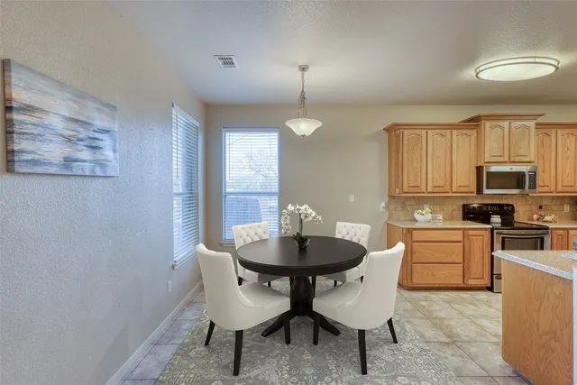 a bathroom with a sink double vanity and a mirror