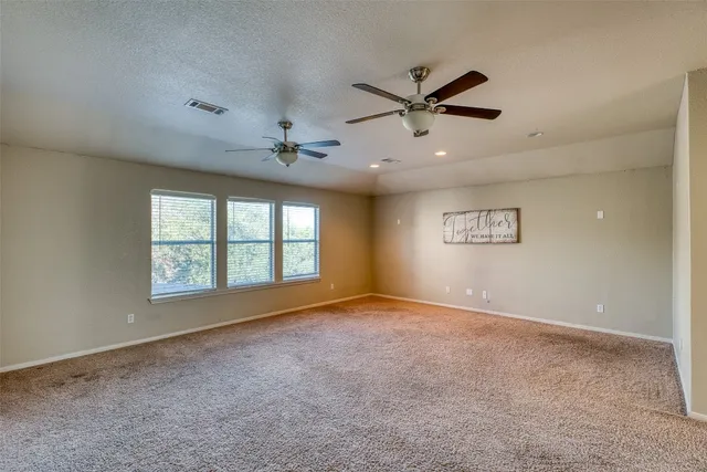 a view of a swimming pool with a yard