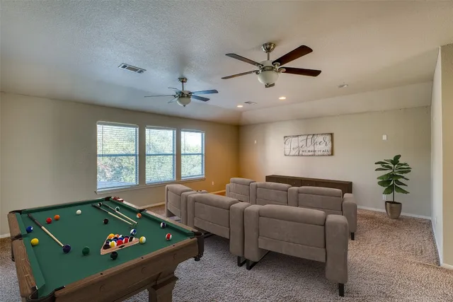 a house view with a swimming pool